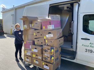 Nancy with so many food boxes