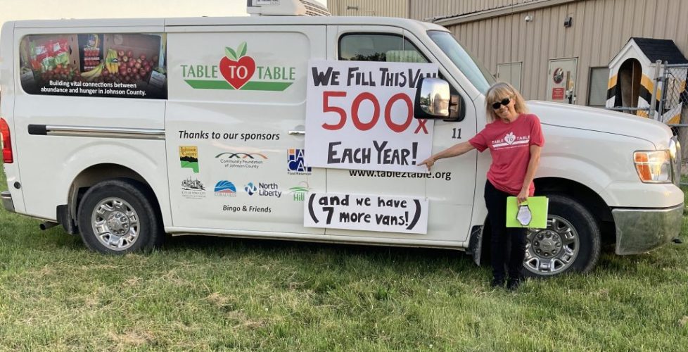 Table to Table cargo van with logo and sign reading "this van filled 500 times a year"