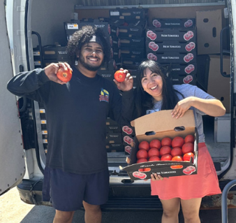 We distributed a 1,300 pound tomato donation through partners and a free produce stand.