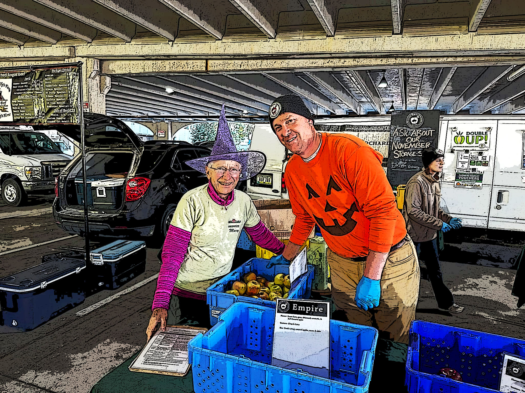 T2T volunteer mary palmberg poses with farmer's market vendor.